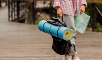 woman-holding-map-her-baggage
