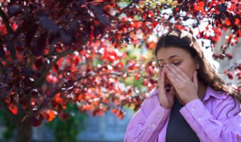 woman-suffering-from-allergies-outside