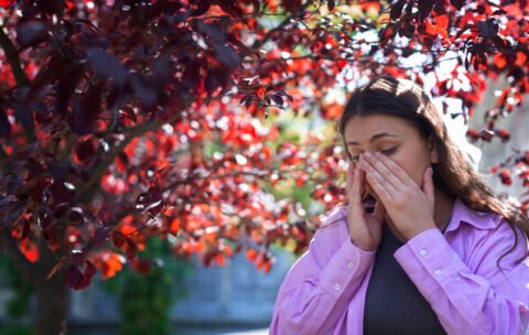 woman-suffering-from-allergies-outside